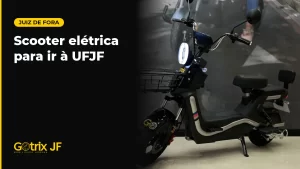 Scooter elétrica Gotrix New Joy preta com cesto dianteiro, em estúdio de fundo amarelo