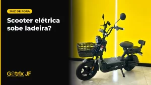 Scooter elétrica Gotrix Iron Joy preta com cesto, em estúdio de fundo amarelo